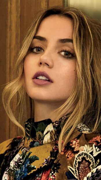 A close up portrait of Ana De Armas with blonde hair and floral dress, 4K Phone Wallpaper