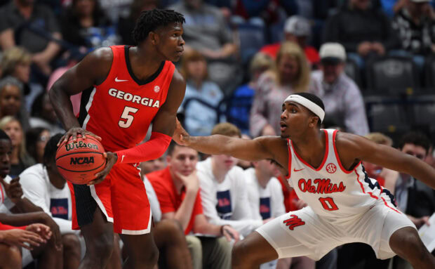Anthony Edwards playing basketball in a game wearing a Georgia jersey number 5