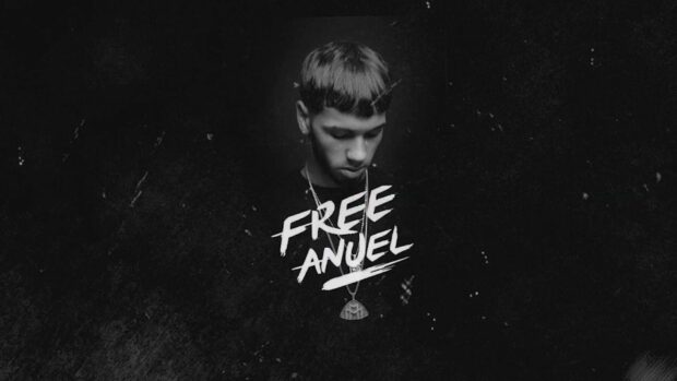 A dark and artistic portrait of Anuel Aa with text Free Anuel, HD Desktop Wallpaper
