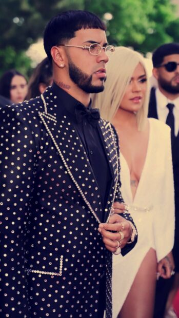 Anuel Aa wears a studded black suit with a bow tie at a formal event, HD Phone Wallpaper