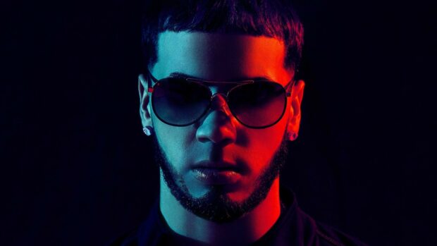 Anuel Aa wears sunglasses in a dramatic colored light setting, HD Desktop Wallpaper