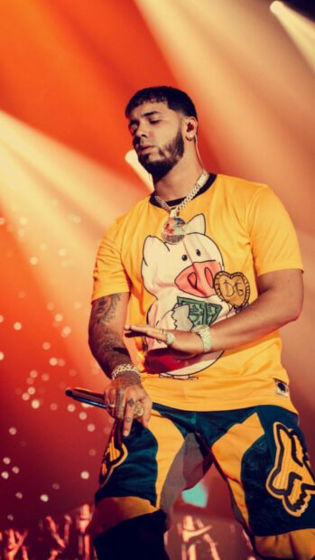 Anuel Aa wallpapers showing the artist deeply engaged in his performance, HD Mobile Wallpaper