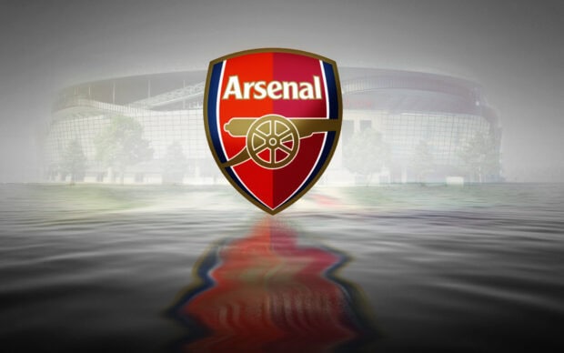 Arsenal crest with stadium reflection representing Arsenal Fc