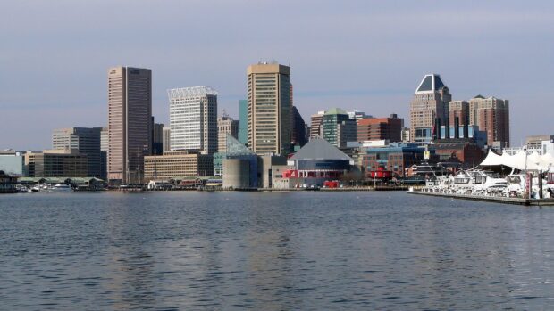 A clear view of Baltimore skyline with tall buildings and waterfront in the cityscape