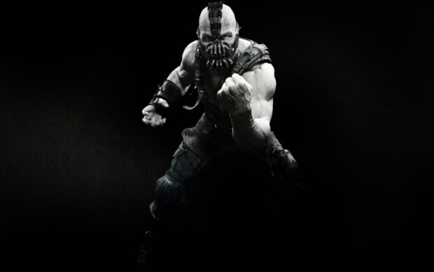 Bane character from Batman showing a powerful fighting pose in dark background