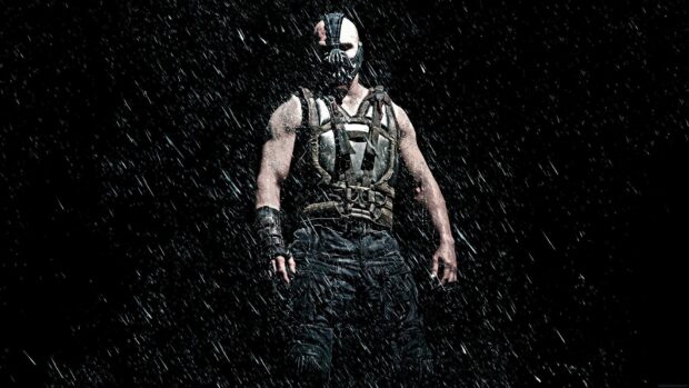 Bane character from Batman standing in the rain with a dark background