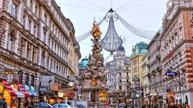 A street view showcases Baroque architecture and festive street decorations in Austria with Austria Wallpapers, HD Desktop Wallpaper