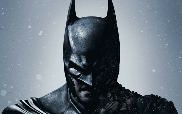 Batman Arkham City showing a close up of Batman's mask and shadowed figures on the side