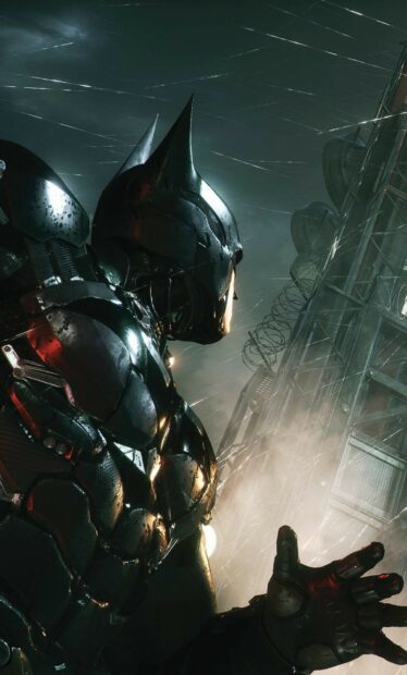 Batman Arkham City wearing armored suit in a dark rainy environment