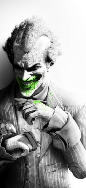 The Joker character from Batman Arkham City game in black and white with green smile paint
