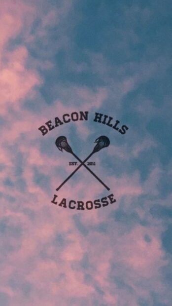The Beacon Hills lacrosse logo is displayed against a pink and blue sky, HD Phone Wallpaper