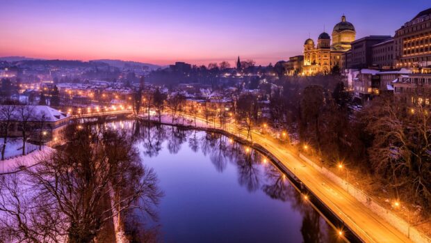 Bern Switzerland Wallpaper HD Desktop A scenic view of Bern Switzerland at dusk with river reflections and illuminated buildings