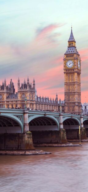 Big Ben stands tall over Westminster Bridge with a colorful sky in this United Kingdom Wallpapers, 2K Phone Wallpaper