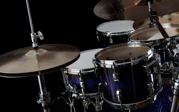 A close up of a blue drum set with cymbals on a black background, 2K Desktop Wallpaper