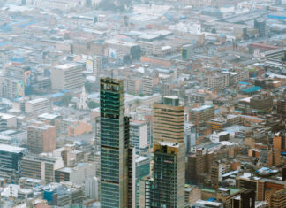 Aerial view of Bogota with skyscrapers and dense urban area, HD Mobile Wallpaper