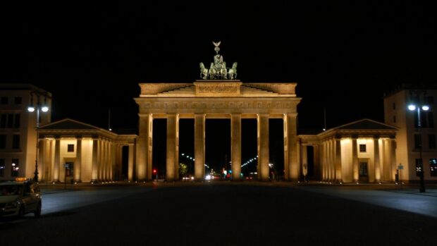 The Brandenburg Gate in Berlin is beautifully illuminated against the night sky, Brandenburg Gate Berlin HD Desktop Wallpaper