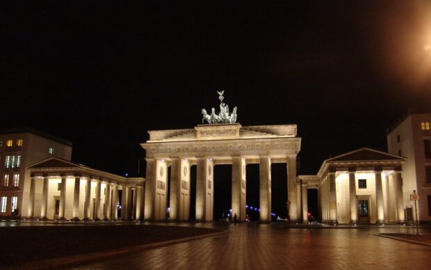 The Brandenburg Gate in Berlin is beautifully illuminated against the night sky, HD Desktop Wallpaper