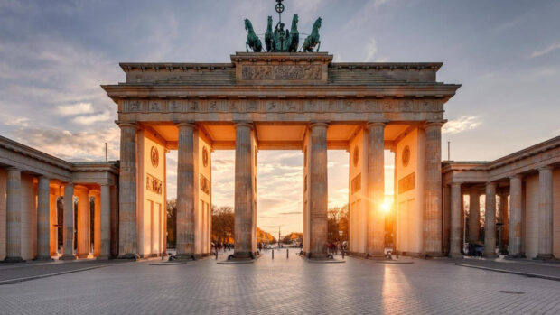 The Brandenburg Gate in Berlin is illuminated by the warm sunset light, HD Desktop Wallpaper
