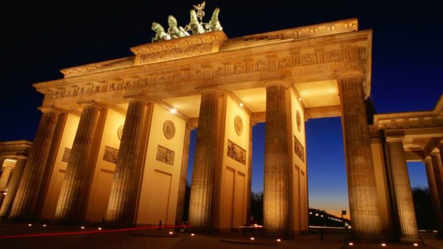 The Brandenburg Gate stands beautifully lit against the night sky in Berlin, HD Desktop Wallpaper