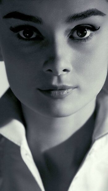 Close up of a woman face with intense eyes from Breakfast At Tiffanys