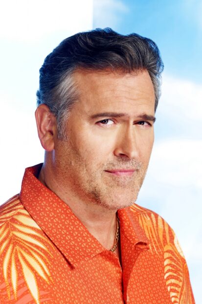 A close up portrait of Bruce Campbell wearing an orange shirt against a bright background, 2K Mobile Wallpaper
