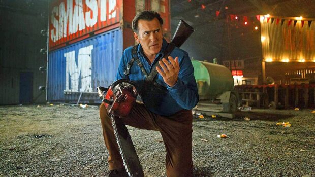 Bruce Campbell holding a chainsaw and shotgun in a night scene, HD Desktop Wallpaper