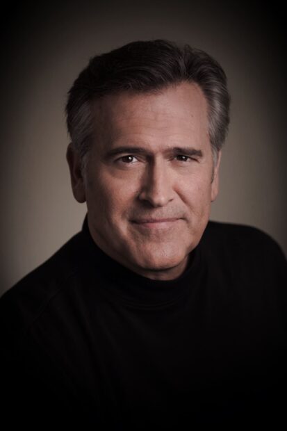 A close up portrait of Bruce Campbell with a neutral expression in dark clothing, HD Mobile Wallpaper