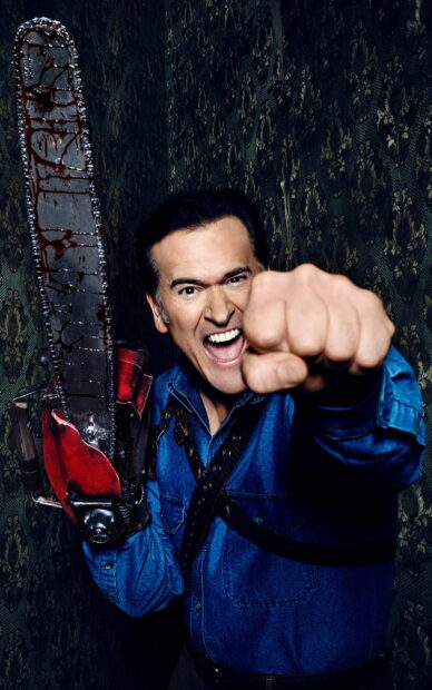 Bruce Campbell wallpapers shows a man holding a chainsaw with an intense expression, HD Phone Wallpaper