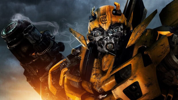 Close up view of Bumblebee Transformers robot with detailed metal parts and blue eyes