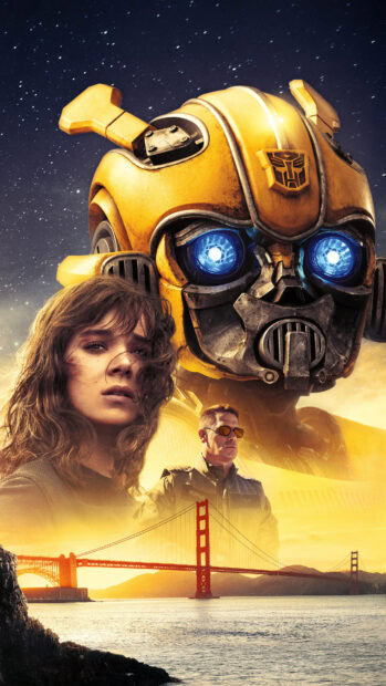 A close up of Bumblebee and two characters with the Golden Gate Bridge in the background