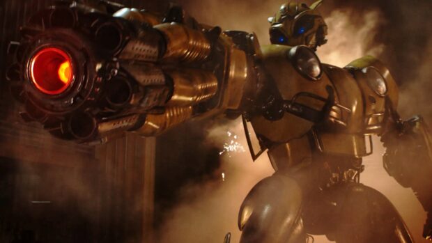 A detailed close up of Bumblebee with glowing blue eyes and a large futuristic cannon in a smoky environment