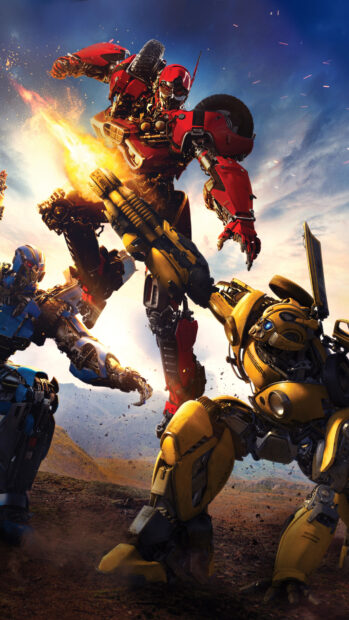 Bumblebee Wallpaper featuring a yellow robot in an action pose fighting a red robot in a dramatic outdoor scene