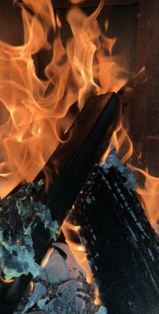 Burning wood logs creating vibrant flames in a cozy fireplace, HD Mobile Wallpaper