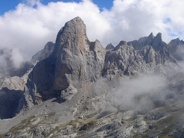 Majestic Cantabrian Mountains forming rugged peaks under a cloudy sky
