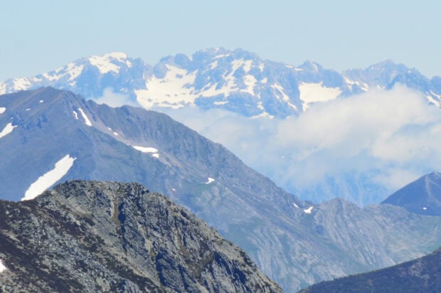 Cantabrian Mountains Wallpaper HD Desktop Mountain ranges of Cantabrian with rocky peaks and patches of snow under a clear blue sky