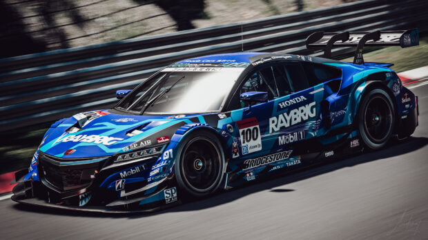 A blue race car with Raybrig branding speeding on the track during a car race