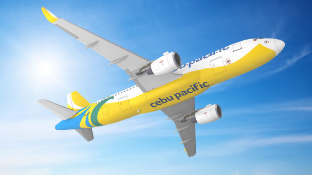 A Cebu Pacific Air airplane flies under a bright blue sky, 2K Desktop Wallpaper