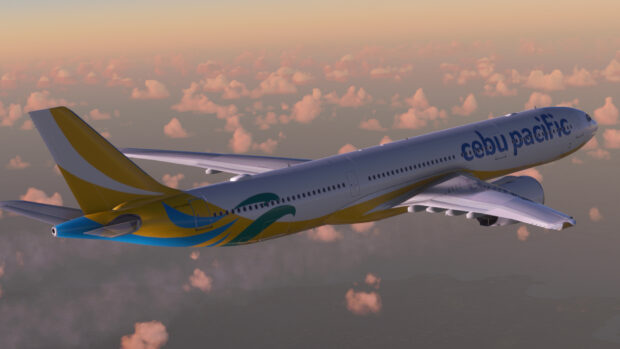 A Cebu Pacific Air airplane flying above the clouds during sunset, HD Desktop Wallpaper