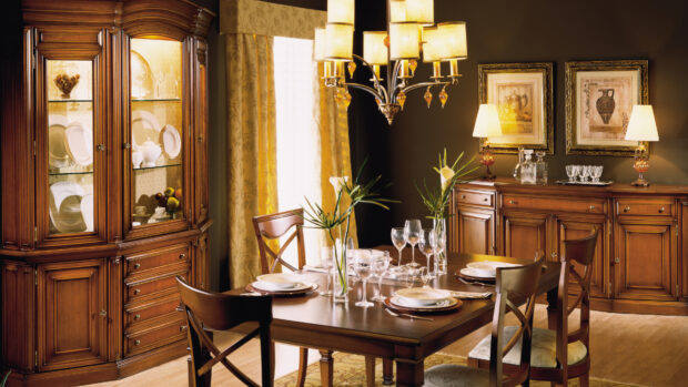 Elegant chandelier with wooden furniture in a classic dining room setting