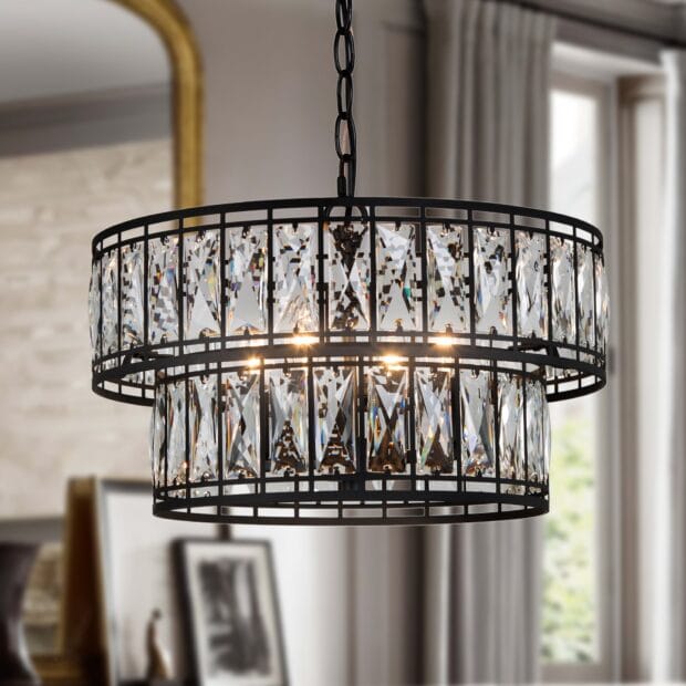A modern chandelier with rectangular crystals hanging in a stylish room