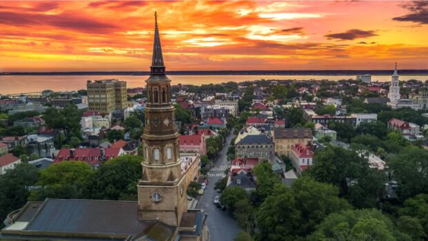 Historic Charleston South Carolina cityscape with church steeple at sunset