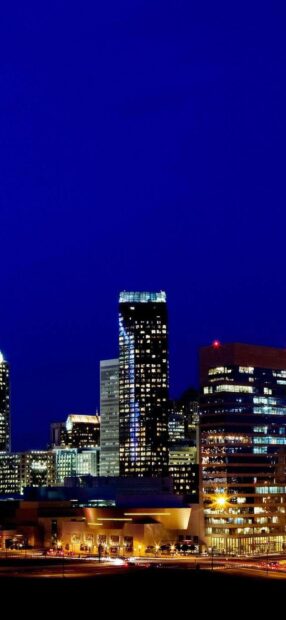 The night view of Charlotte North Carolina shows illuminated skyscrapers and city lights, HD Phone Wallpaper