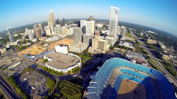 A clear aerial view of Charlotte North Carolina skyline with stadium and buildings, HD Desktop Wallpaper