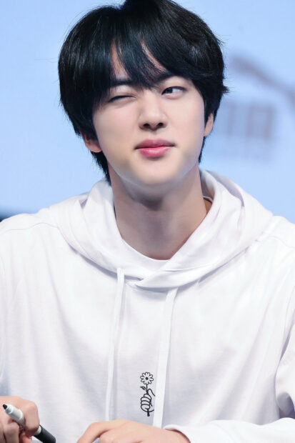 Jin BTS wallpapers show him winking playfully in a white hoodie, HD Mobile Wallpaper