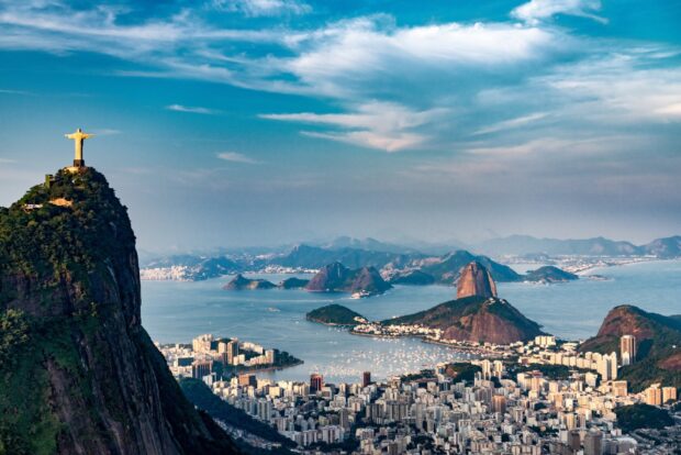 The iconic Christ The Redeemer statue overlooks the city and bay of Rio de Janeiro, HD Desktop Wallpaper