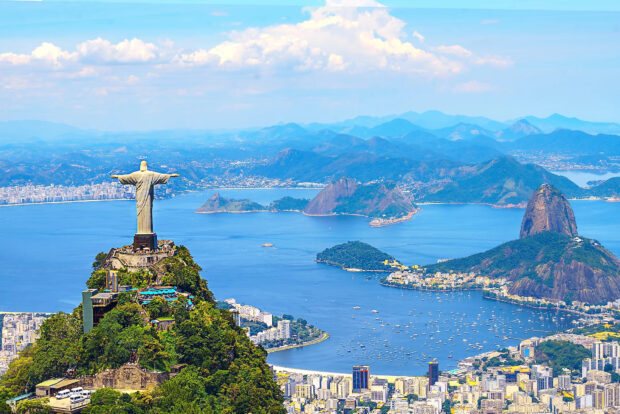 The Christ The Redeemer statue stands tall above the city and bay, HD Desktop Wallpaper