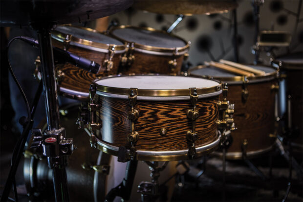 A detailed view of drums showcasing wooden textures and metallic hardware, HD Desktop Wallpaper