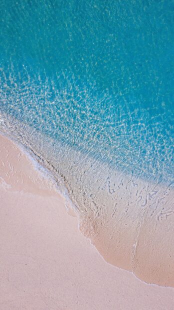 The clear water gently flows over the sandy shore in Malawi creating a peaceful scene with Malawi Wallpapers, 4K Phone Wallpaper