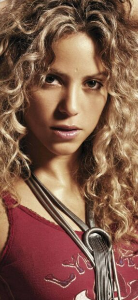 A close up portrait of Shakira with curly hair and a red top, HD Phone Wallpaper