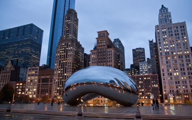 The Cloud Gate Chicago reflects city lights during dusk with surrounding skyscrapers, HD Desktop Wallpaper